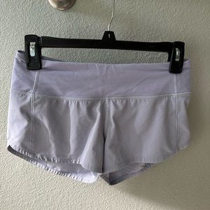 Light lavender lululemon size 2 speed shorts. Excellent mint condition.
